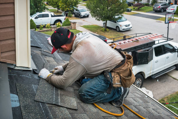 Professional Roofing technician working in Center Rutland, VT